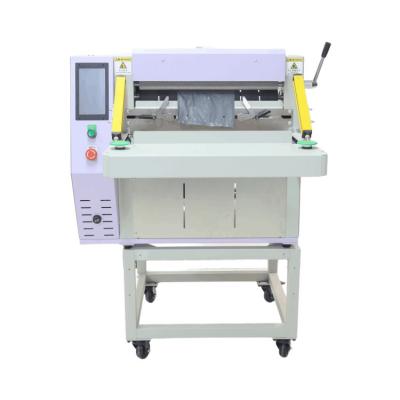 Tabletop auto bagger machine for ecommerce
